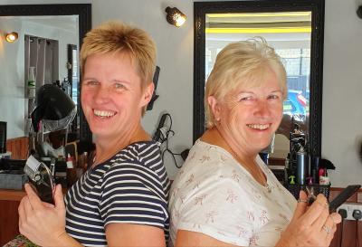Cath and Tess brace themselves for their double head shave