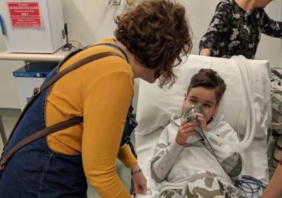 Claire with Theo in hospital