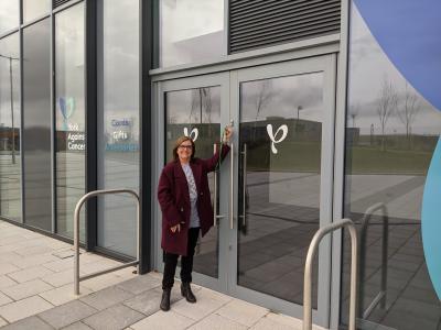 Julie Russell with the keys to our new headquarters