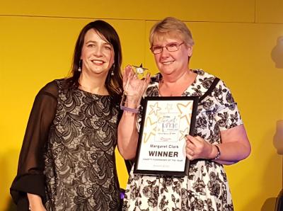 Margaret receiving a Community Pride award