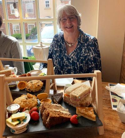 Joan enjoys afternoon tea during her time at Filey