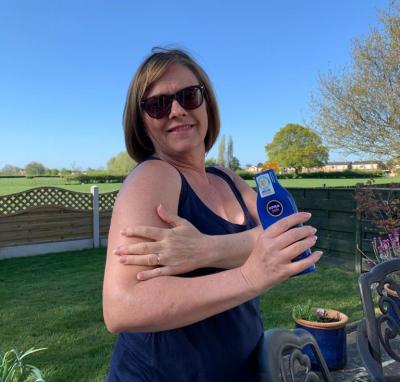 Julie shows how sun lotion is vital when you are out and about
