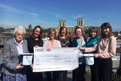 M&S staff celebrate with our staff and volunteers
