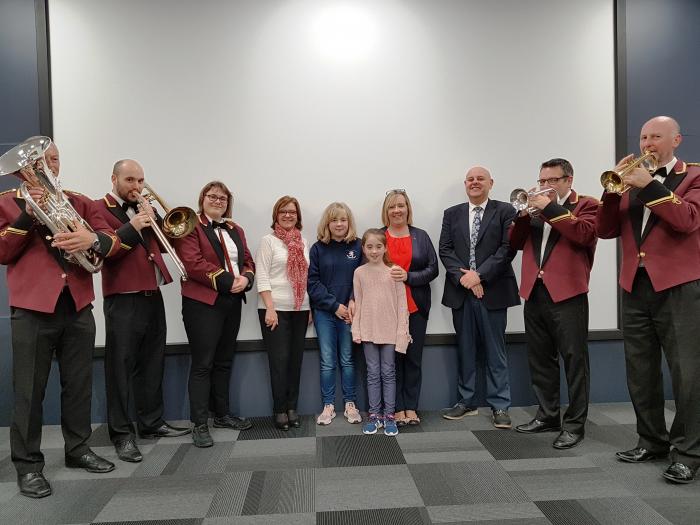 Band members with organisers of the Christmas concert Band members with organisers of the Christmas concert