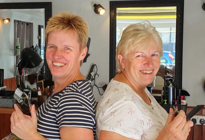 Cath and Tess brace themselves for their double head shave Cath and Tess brace themselves for their double head shave
