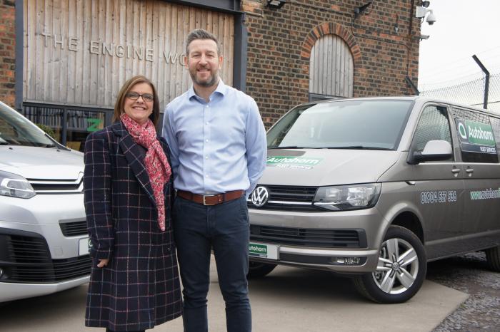 Picture shows Julie Russell with Fraser Maclean, Fleet Director of Autohorn, and the minibuses that saved the day Picture shows Julie Russell with Fraser Maclean, Fleet Director of Autohorn, and the minibuses that saved the day