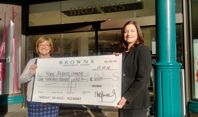 Julie Russell being presented with a cheque