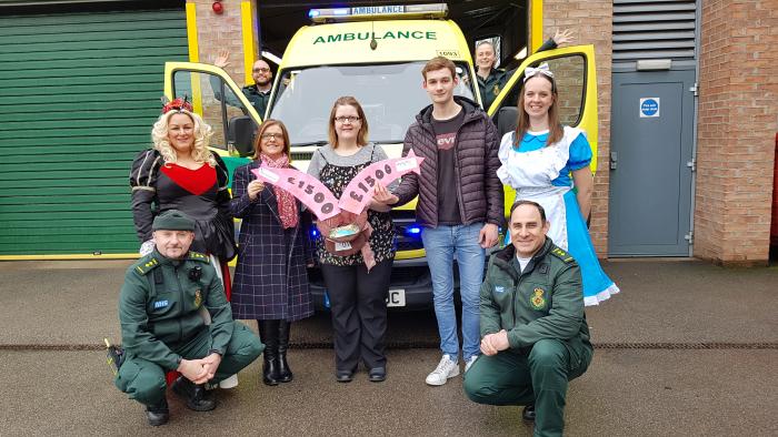 Panto members hand over the cash raised at their 2019 show Panto members hand over the cash raised at their 2019 show