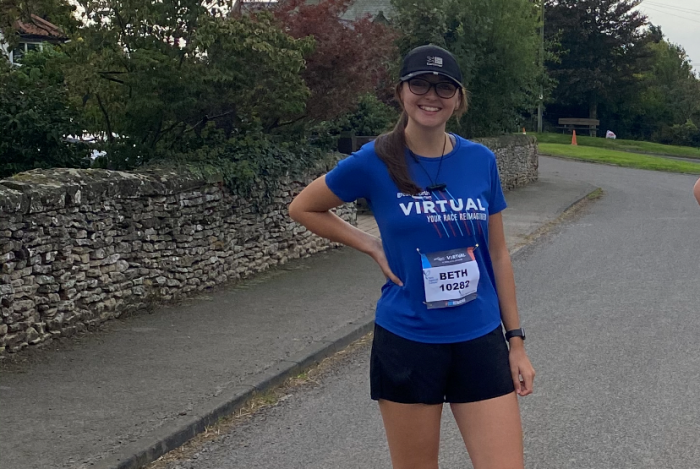 Beth in her virtual run tee shirt