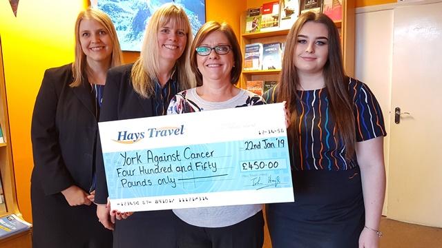 Our general manager Julie Russell with the Hays Travel team Our general manager Julie Russell with the Hays Travel team