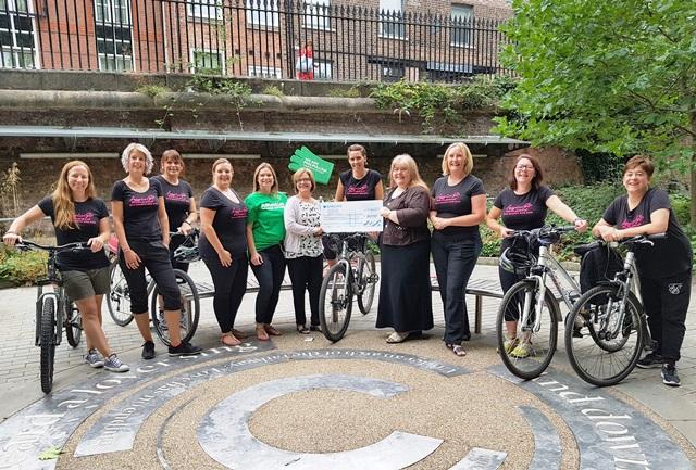 Members of the Heels on Wheels team with cancer charity representatives Members of the Heels on Wheels team with cancer charity representatives