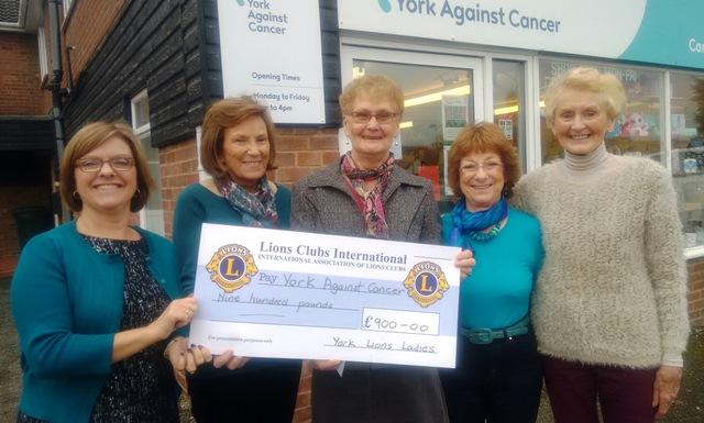 The Lions Ladies hand over their cheque The Lions Ladies hand over their cheque